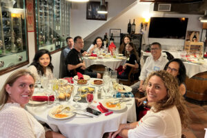 International students enjoying happy hour at Xixon